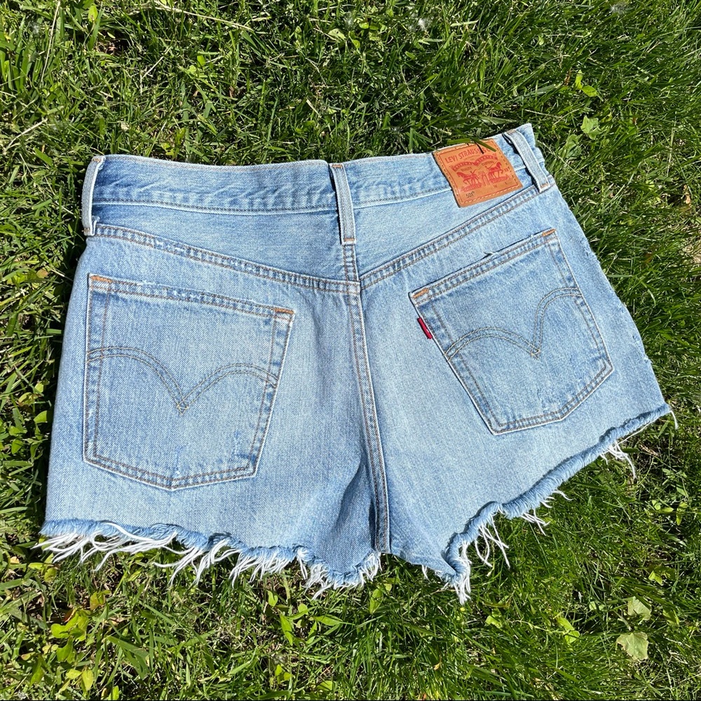 Levi Distressed Buttonfly Cutoffs - image 1